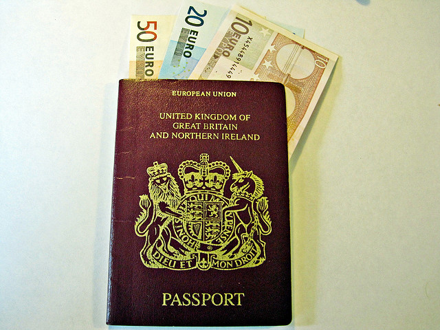 Don't book before your passport comes through. (Photographer: Images Money; Flickr)